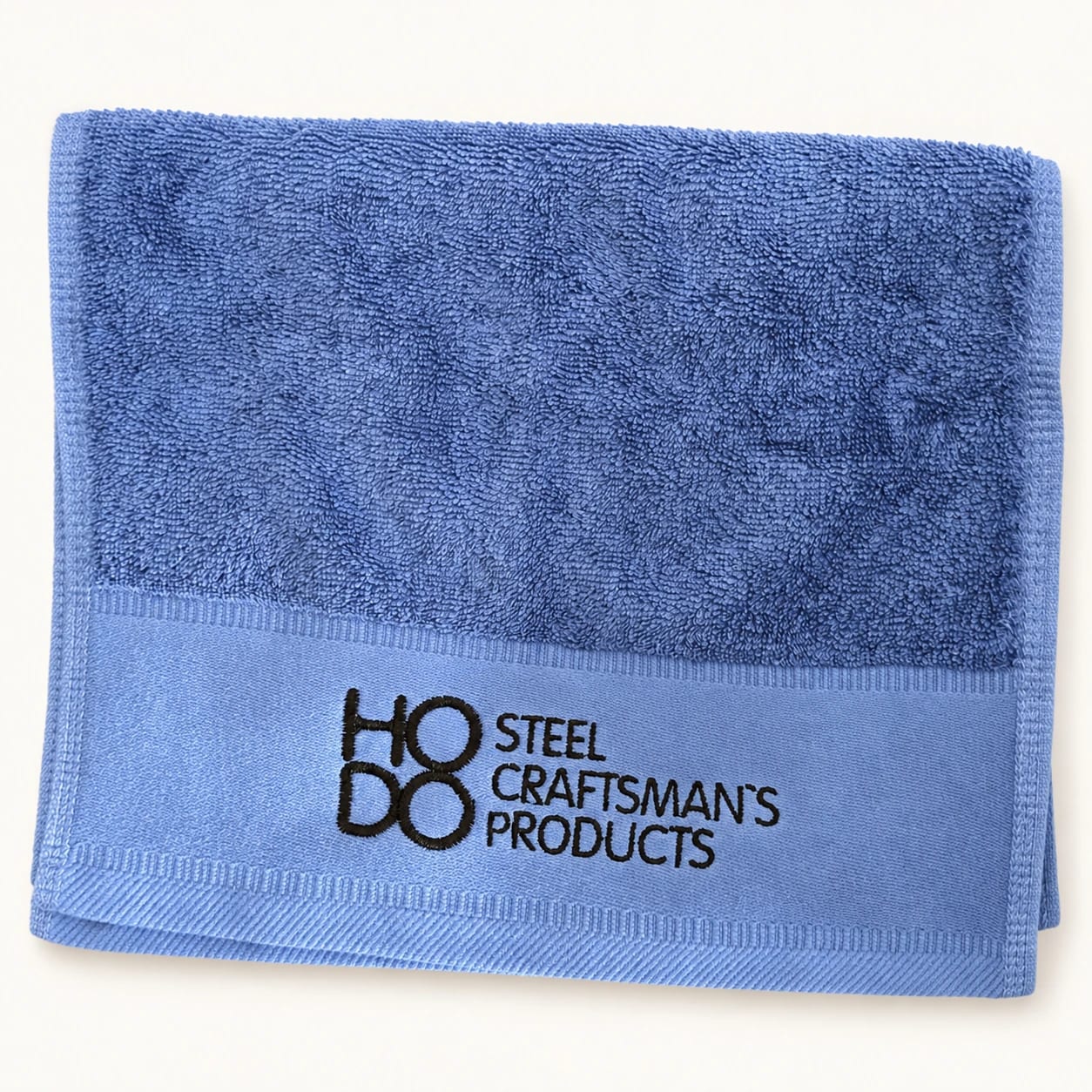 blue embroidered hand towel